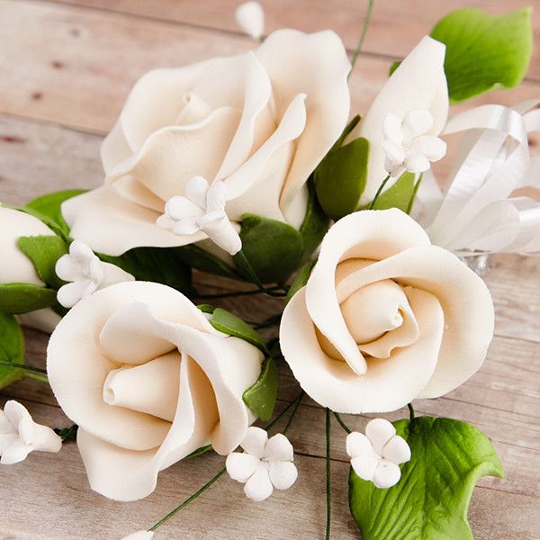 Trio Garden Rose Sprays in Ivory are gumpaste sugarflower cake decorations perfect as cake toppers for cake decorating fondant cakes and wedding cakes. Caljava wholesale cake supply.
