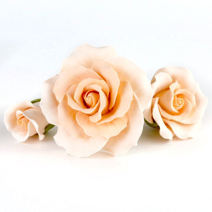 Mixed colors and sizes of Gumpaste Roses handmade sugar cake decorations and cake topper perfect for rolled fondant wedding cakes and birthday cakes cake decorating. Wholesale sugarflowers and cake supply. Caljava