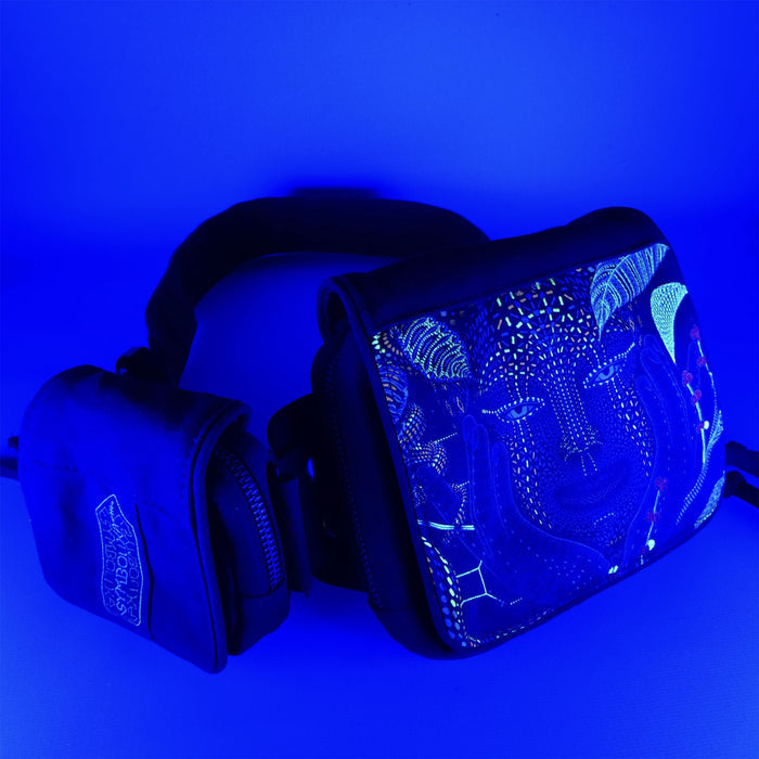 AYA design belt bag glowing under blacklight showing vibrant colors by Symbolika