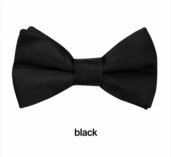 **Boys Matte Black Bow Tie**

Complete the perfect formal look with our classic Boys Matte Black Bow Tie. Featuring a sophisticated matte finish, it's the ideal accessory for weddings, school formals, page boys, black-tie events, and special occasions.

* Elegant matte finish for a modern look
* Bow measures **8.5cm** across
* Adjustable neck strap with a **full length of 45cm**
* Comfortable, secure fit
* A timeless finishing touch for every young gentleman

Smart, stylish, and easy to wear—an