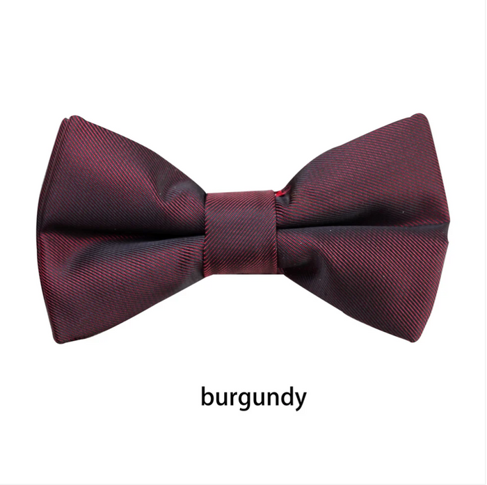 **Boys Matte Bow Tie**

Complete the perfect formal look with our classic Boys Matte Black Bow Tie. Featuring a sophisticated matte finish, it's the ideal accessory for weddings, school formals, page boys, black-tie events, and special occasions.

* Elegant matte finish for a modern look
* Bow measures **8.5cm** across
* Adjustable neck strap with a **full length of 45cm**
* Comfortable, secure fit
* A timeless finishing touch for every young gentleman

Smart, stylish, and easy to wear—an essent