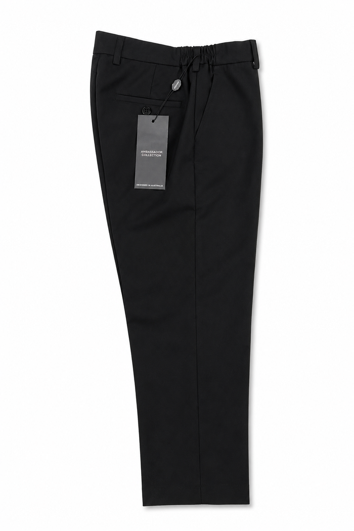 Black slim-fit trousers with an elastic drawstring waist and a side pocket, shown flat on a white background with a product tag attached.