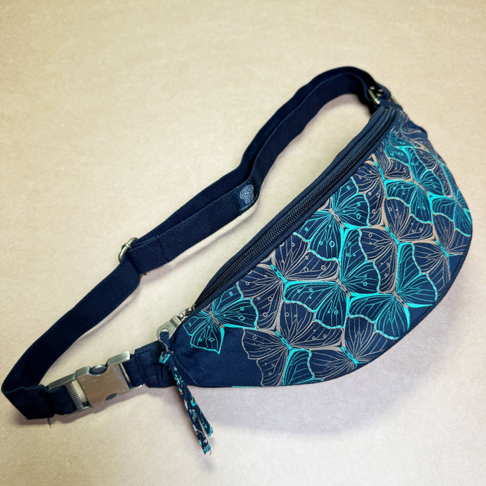 Butterfly Morph Canvas Fanny Pack - turquoise metamorphosis pattern on navy canvas by Symbolika