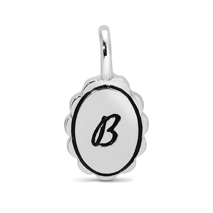 A silver pendant with a loop at the top features the letter 'B' in black on an oval surface.