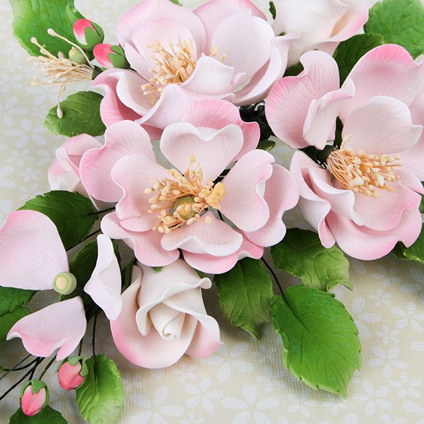 Dog Rose Combo Sprays in Pink are gumpaste sugarflower cake decorations perfect as cake toppers for cake decorating fondant cakes and wedding cakes. Caljava wholesale cake supply.