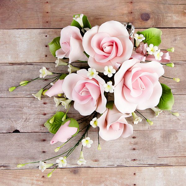 Garden Rose Sprays in Pink are gumpaste sugarflower cake decorations perfect as cake toppers for cake decorating fondant cakes and wedding cakes. Caljava wholesale cake supply.