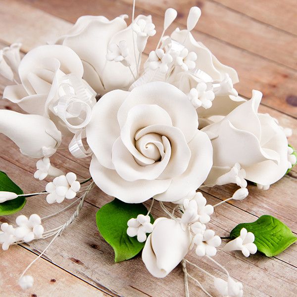 Garden Rose Sprays in White are gumpaste sugarflower cake decorations perfect as cake toppers for cake decorating fondant cakes and wedding cakes. Caljava wholesale cake supply.