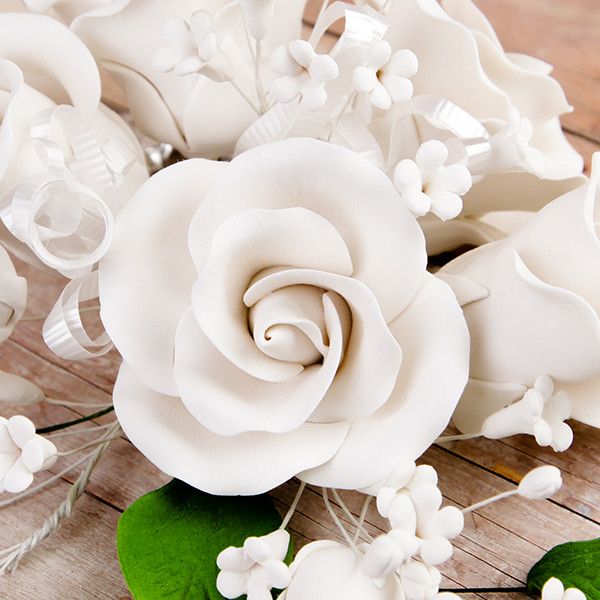Garden Rose Sprays in White are gumpaste sugarflower cake decorations perfect as cake toppers for cake decorating fondant cakes and wedding cakes. Caljava wholesale cake supply.