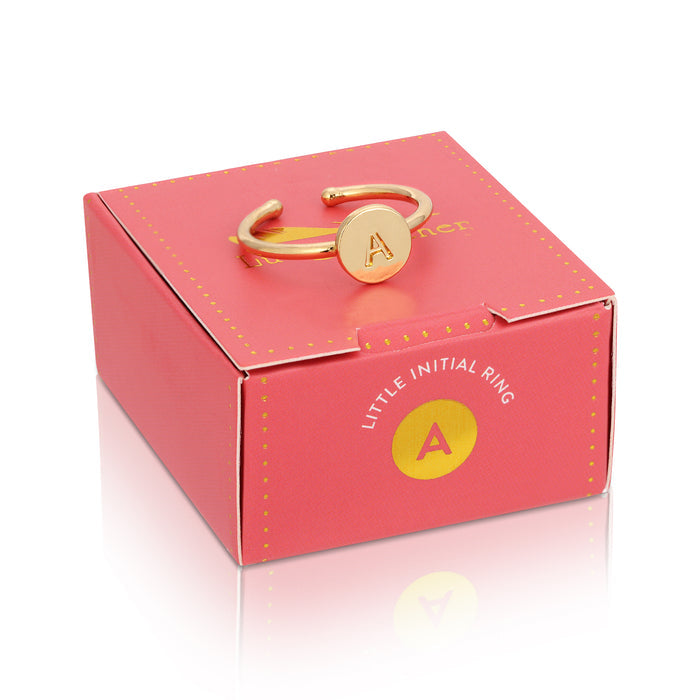 A ring with the letter 'A' is sitting on top of a pink box labeled 'Little Initial Ring.'