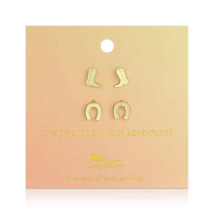 Two sets of earrings (cowboy boots and horseshoes) are displayed on a peach colored card.