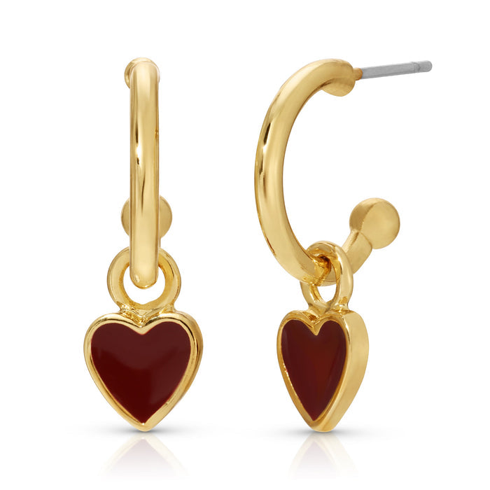 Two gold hoop earrings with burgundy heart-shaped pendants are displayed on a white background.