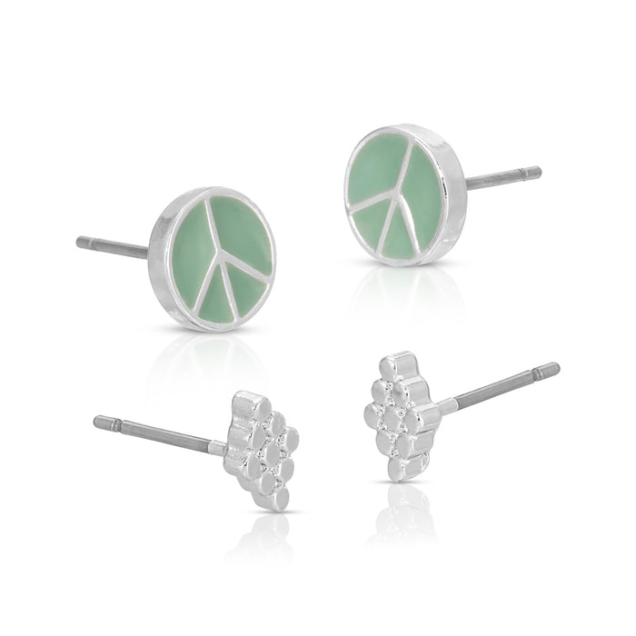 Four earrings are displayed, two with peace symbols in a mint green color and two with a cluster of silver circles.