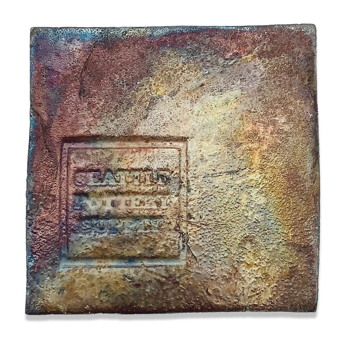 Raku glaze tile with gold, blue, and iridescence
