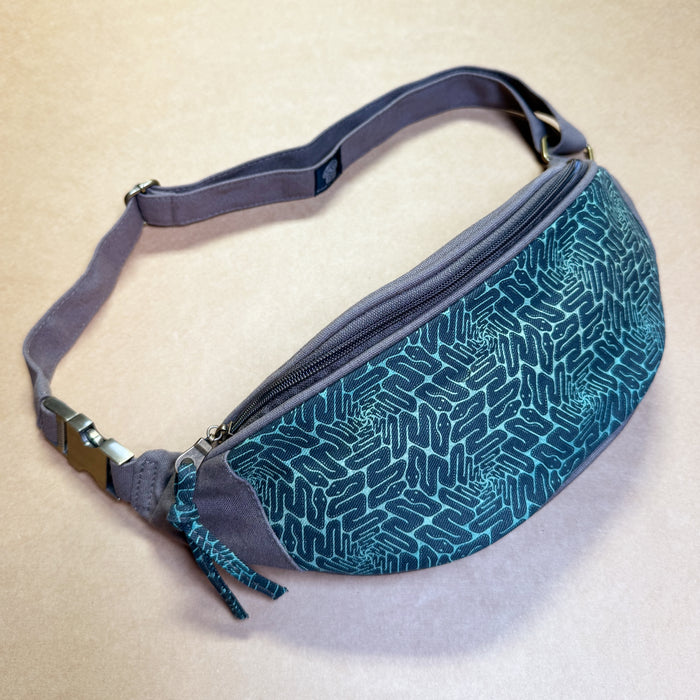 Snaxagons Gradient Fanny Pack - Serpentine tessellation art in teal gradient by Symbolika