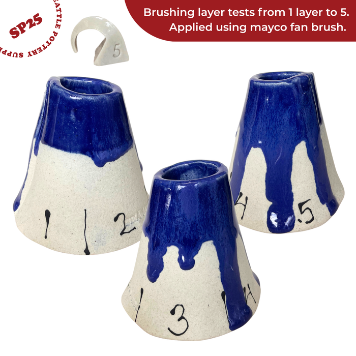 SP25 Dark Blue Mottled glaze brushing tests on three cone test pieces, 1 to 5 layers, showing drips as layers increase