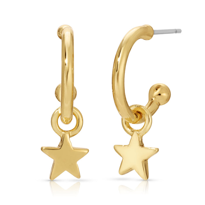 The image shows a pair of gold hoop earrings with star charms.