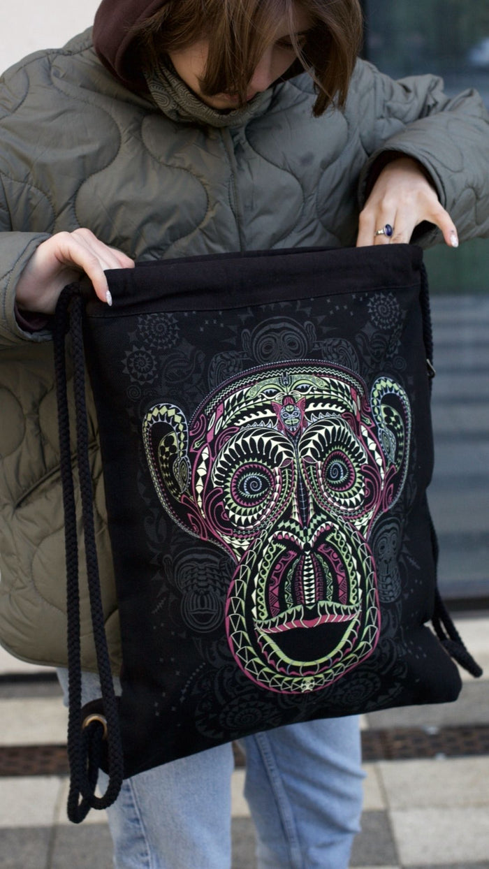 Tā Moko Drawstring Bag Psychedelic Art Print on Black T-Shirt by Symbolika