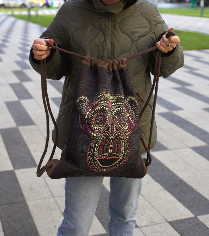 Tā Moko Drawstring Bag Psychedelic Art Print on Black T-Shirt by Symbolika