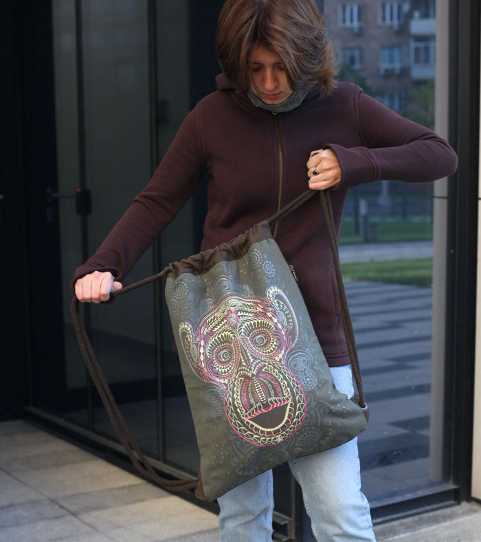Tā Moko Drawstring Bag Psychedelic Art Print on Black T-Shirt by Symbolika