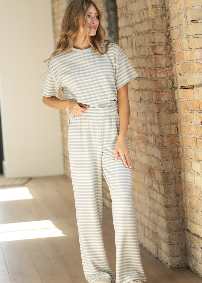 Light blue striped Bailey tee styled with matching wide-leg striped pants.