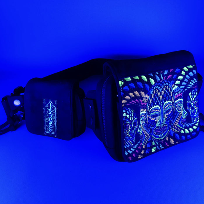 UV reactive psychedelic belt bag with geometric patterns glowing under blacklight