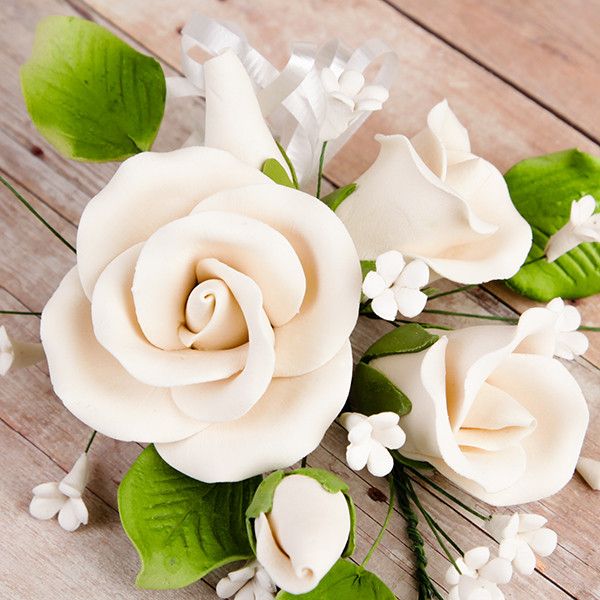 Trio Garden Rose Sprays in Ivory are gumpaste sugarflower cake decorations perfect as cake toppers for cake decorating fondant cakes and wedding cakes. Caljava wholesale cake supply.